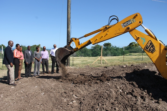 Hon. Alexis Jeffers, Chairman of the Board of Directors of the Nevis Housing and Land Development Corporation, board members, Oscar Walters, Chairman of the St. Christopher and Nevis Social Security Board and Sydney Newton, Manager of the Nevis Cooperative Credit Union witness the ground breaking at 14 Acres on February 24, 2017, signalling the start of works at the Cedar View Housing Development at Maddens
